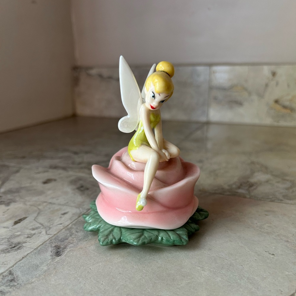 Fairy Figurine on Pink Rose